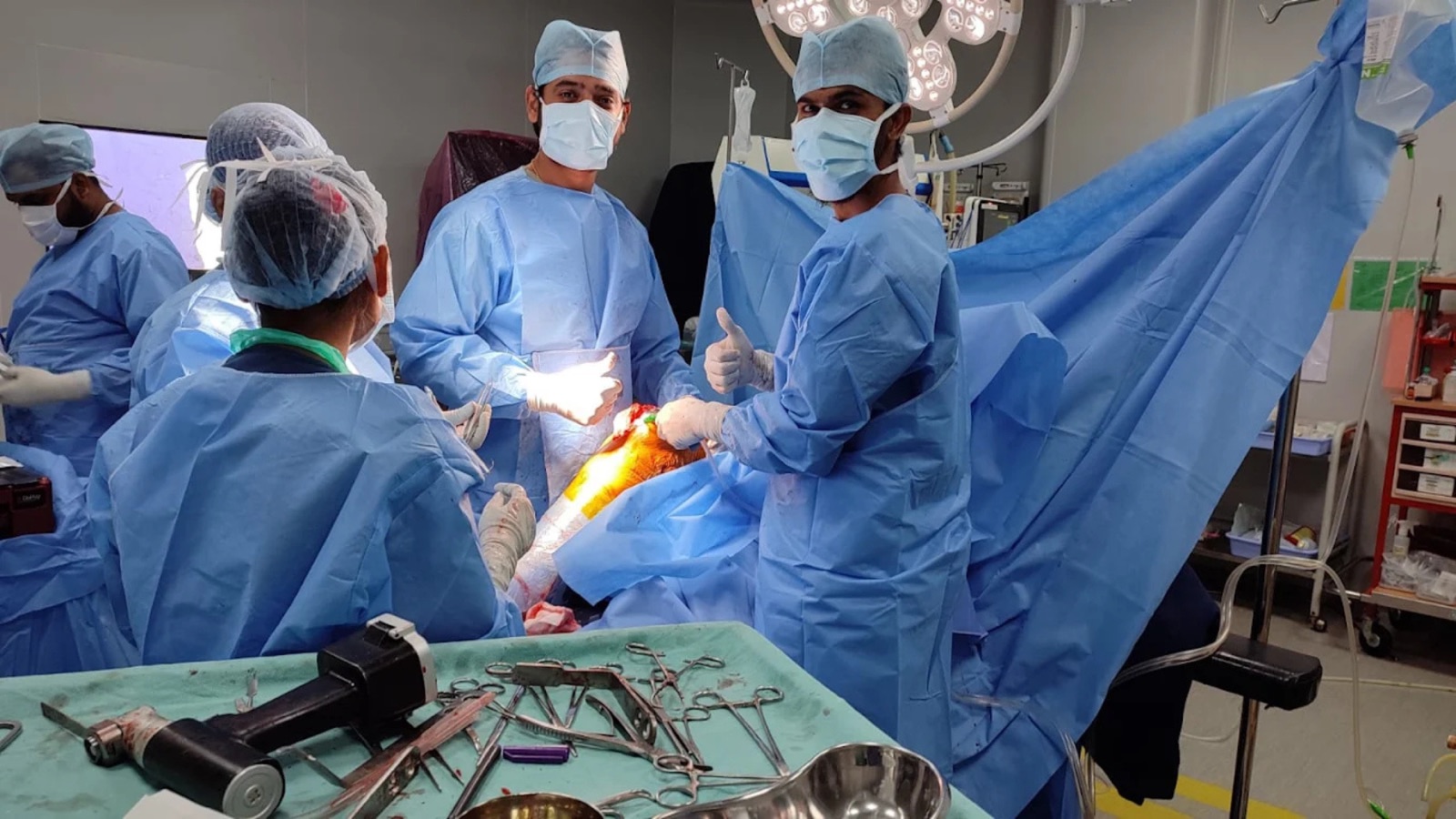 Dr. Arun Dev and the surgical team in the operating theatre at Renova Hospital